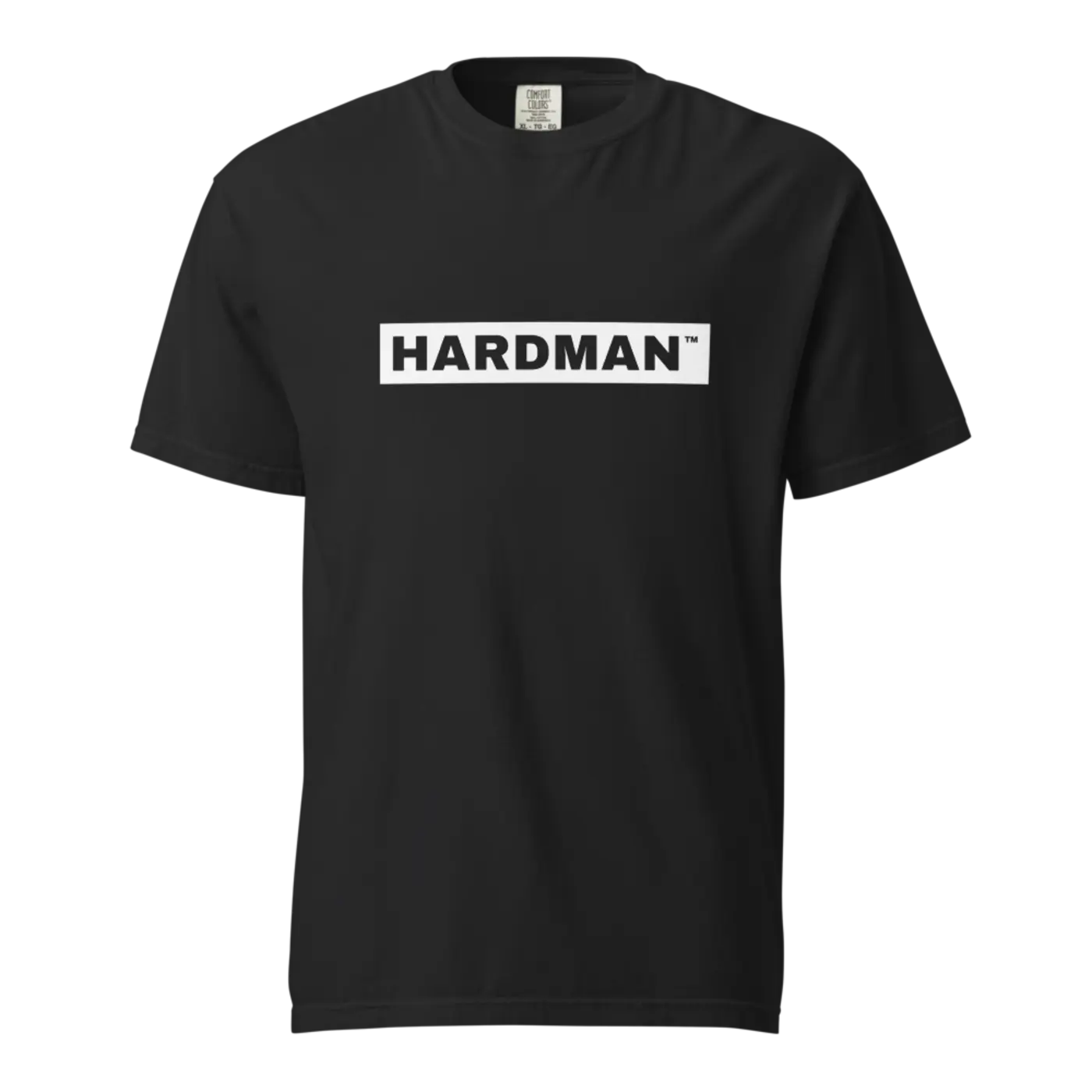 A black heavyweight t-shirt with HARDMAN reversed out of a solid white bar across the chest.